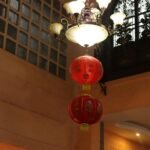 a chandelier hanging from the ceiling of a building